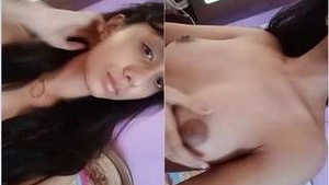 Sexy girl capturing her own erotic selfies