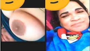 Watch as this horny babe flaunts her big tits and wet pussy