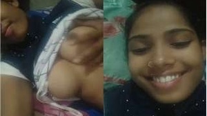 A stunning Indian woman gives a blowjob and reveals her breasts