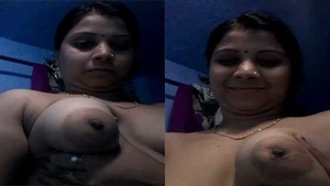 Busty bhabhi flaunts her assets with a happy and inviting expression