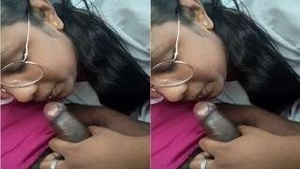 Tamil girl performs oral sex in a car