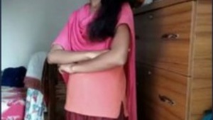 Watch a cute Indian girl pleasure herself with her fingers