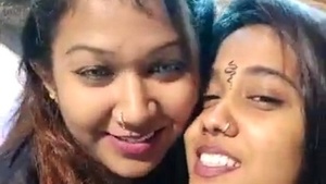 Two Indian women share a passionate kiss in a steamy lesbian video