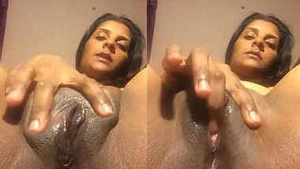 Horny Indian aunty fingering her wet pussy with loud moans