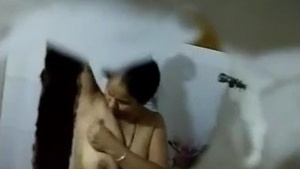 Bhabhi Anita showers and teases in the next door video