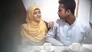 Desi couple enjoys a secret rendezvous in a restaurant, captured on hidden camera