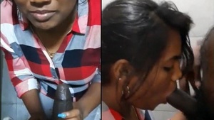 A mischievous office employee performs oral sex on a colleague in the workplace