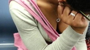 HD video of a woman flashing her breasts on a train