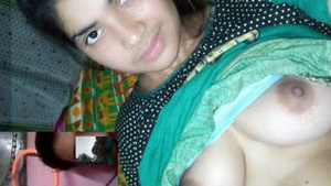 A young and cute desi girl reveals her natural body on camera