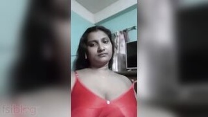 Mature woman with curvy body flaunts her large breasts on camera