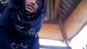 Small boobed Indian hijabi teen shows off her pretty pussy in a solo video