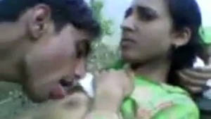 Desi girl enjoys the outdoors with a guy in the fields