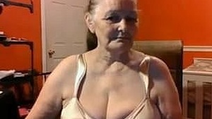 Watch a mature Canadian woman with large breasts in this video