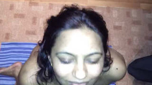 Cute Indian girl enjoys a facial cumshot in a steamy video