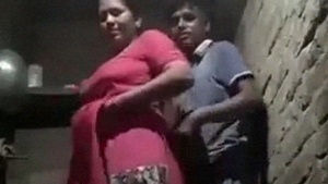 Desi aunty indulges in steamy doggy style sex with her young lover