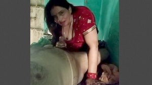 Desi bhabhi gives a blowjob and handjob to her husband's big dick