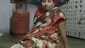 Aunty Sailaja shows off her curves in a MILF video