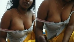 Big boobs girl gives a handjob to her Tamil lover
