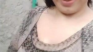 Watch a Pakistani girl with her huge breasts in action