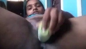 Sexy bhabhi uses a cucumber to pleasure herself
