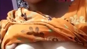 Busty Indian babe flaunts her breasts and pussy in solo video