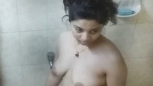Desi babe's nude bathing captured on camera