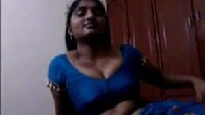 Busty Indian wife strips naked and gives a steamy blowjob