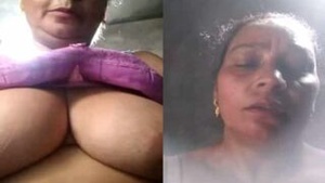Aunty in lingerie flaunts her big boobs and sexy curves in a selfie video