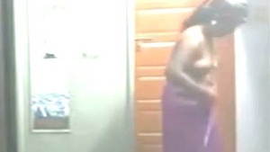 Surprising hidden camera footage of an Indian aunt undressing
