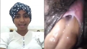 Sri Lankan girl's hairy pussy gets fingering in video