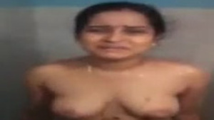 Telugu bhabhi's nude bath and clothing in HD video