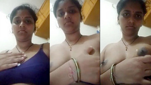 Indian bhabhi flaunts her luscious breasts and pussy for her husband