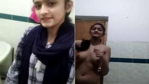 Indian college girl gets naughty in a bathroom