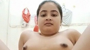 Watch a stunning Indian girl in the nude in a bathroom