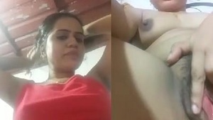 Indian bhabi pleasures herself with her fingers in a seductive manner