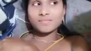 Tamil wife with huge breasts giving a blowjob