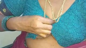 Tamil aunt flaunts her big boobs and cunt