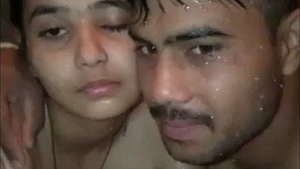 Cute couple takes a bath in India in this video clip