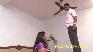 Indian Aunty gets caught by electrician while masturbating