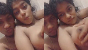 Indian guy has fun with a girl's small boobs on camera