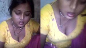 A sweet girl enjoys a chapathi while showcasing her milky cleavage