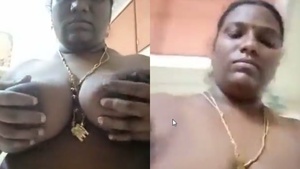 Indian bhabhi with big boobs and fringe flaunts her body and pussy in a video